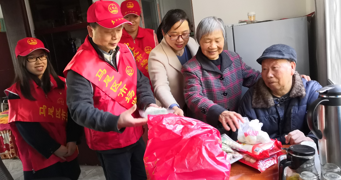 区市场监管局开展拗九节暨学雷锋日志愿活动